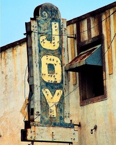 An old marque with the word "joy" on it